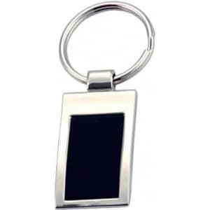 A keyring featuring a rectangular silver frame with a black insert. It has a circular keyring attachment.