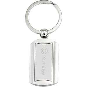 A silver metal keyring with a rectangular design and a logo feature.