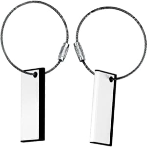 A pair of metal cable tags with a black border and a reflective surface, designed for labelling or identification.