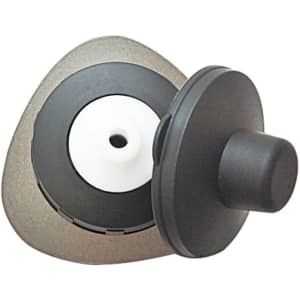 A drink bottle cap with a black and white design, featuring a rounded top and a triangular base.