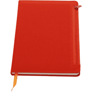 A red notebook featuring a zipper closure and a ribbon bookmark. The notebook has a textured cover with a logo.