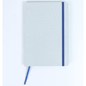 A grey notebook featuring a blue elastic band and dotted design, complete with a ribbon marker.