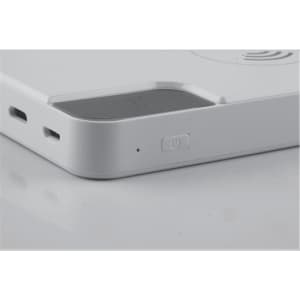 A white power bank featuring charging ports, a power button, and a sleek design with rounded edges.