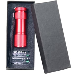 A drink bottle in a sleek black box with a red, textured exterior and a matching strap. It features a logo.