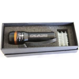 A black LED torch in a box with a flexible focus feature and a protective foam insert.