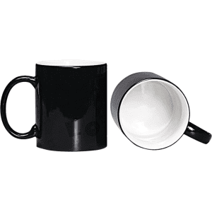 A coffee mug in black with a glossy finish and a contrasting white interior. It features a handle and includes a logo.