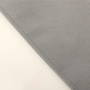 A close-up of a grey non-woven material, showcasing its texture and stitching details.