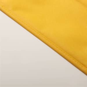 A drink bottle in vibrant yellow with a textured surface and a logo.