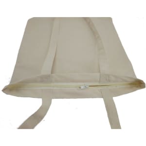 A canvas tote bag in a natural beige colour with a zipped top and two handles.