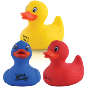 Three PVC bath ducks in yellow, blue, and red, featuring playful designs and logos.