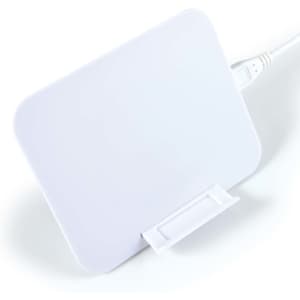 A wireless charger in white, featuring a rectangular design with a attached cable.