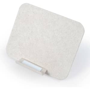 A wireless charger made from eco-friendly materials with a sleek, minimalist design.