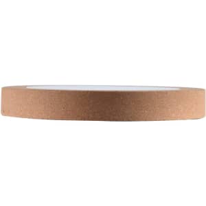 A circular wireless charger with a cork exterior and a smooth white surface on top. Features a subtle logo.