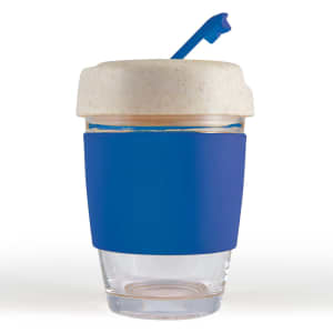 A reusable coffee cup with a clear glass body, a blue silicone band, and a cream-colored lid with a straw.