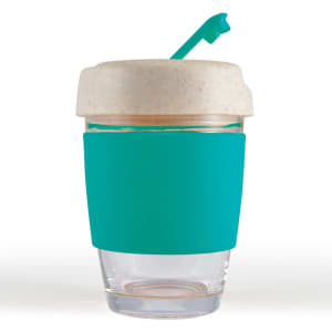 A reusable coffee cup with a teal silicone band and a light-colored lid, featuring a straw. It has a logo on the side.