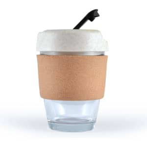 A reusable coffee cup with a clear glass body, a cork band for grip, and a white lid featuring a black straw.