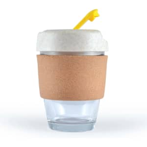 A reusable coffee cup featuring a clear glass body with a cork band and a light-colored lid topped with a yellow straw.