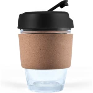 A reusable coffee cup with a clear body and a black lid, featuring a cork band for insulation.