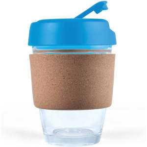 A reusable coffee cup with a clear body, a blue lid, and a cork band for insulation.