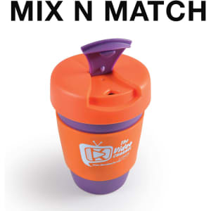 A reusable coffee cup in orange and purple with a silicone band and a cap. It features a logo.