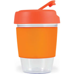 A reusable coffee cup featuring a transparent base and an orange silicone band and lid.