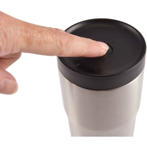 A stainless steel travel mug with a black lid and a finger pressing on the top, featuring a logo.