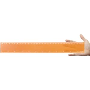 A transparent 30cm ruler held in a hand, featuring clear metric and imperial measurements along its length.