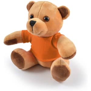 A plush teddy bear named Honey, featuring a soft, light brown body and a cute expression, dressed in an orange shirt.
