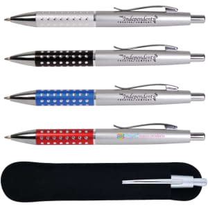 Four metal pens in silver, black, blue, and red, featuring decorative motifs and a carrying case. Each pen has a logo.