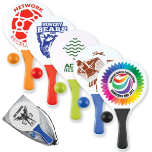A set of five colourful paddles with matching balls, featuring various logos and a mesh storage bag.