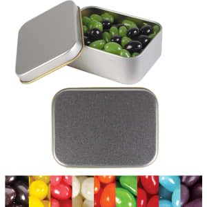 Silver rectangular tin filled with green and black jelly beans, with a variety of colorful jelly beans displayed below.