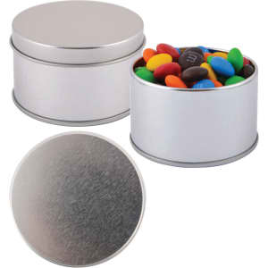 A silver round tin filled with colorful M&M's candies, featuring a smooth metal lid.