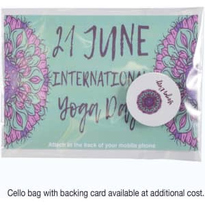A cello bag contains a backing card with colorful mandala designs and a circular tag for phone attachment.