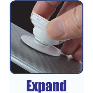 A phone grip is being expanded by a hand, with a textured background showcasing its design.