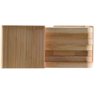 A set of six bamboo coasters in various shades of natural wood, neatly stacked with a visible logo on one coaster.