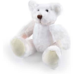 A soft, white plush teddy bear with pale yellow accents sitting with its arms and legs spread out.