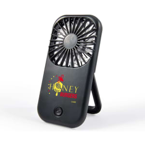 A portable black fan with a stand and a logo on the front, designed for leisure and outdoor use.