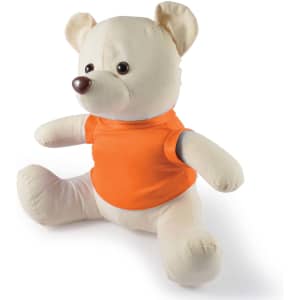 A plush bear in a light cream color with a brown nose, wearing an orange shirt. It has a friendly expression and is seated.