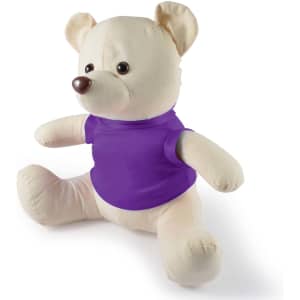 A plush toy bear dressed in a purple shirt, featuring soft, light-colored fur and a simple facial design.
