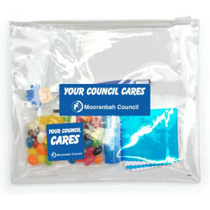 A clear zip pouch containing jelly beans in various colours, a drink bottle, and a blue foil packet. Includes branding.