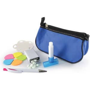 A blue cosmetic pouch contains a white lip balm, a dispenser, a pen, colorful sticky notes, and small white tablets.