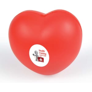 A red heart-shaped stress reliever with a logo on its surface, designed for fun and relaxation.