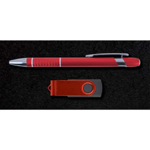 A red pen and a red USB flash drive are presented on a black textured background. The pen has a silver clip.