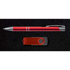 A red pen and a red USB flash drive on a black background, presented in a sleek gift set.
