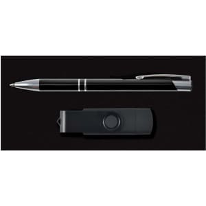 A pen and a flash drive are displayed in a sleek black gift set.