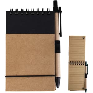 A brown cardboard notebook with a black cover and a black pen attached, featuring spiral binding.
