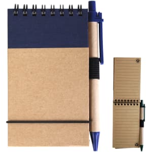 A cardboard notebook with a navy top and spiral binding, accompanied by a blue pen.