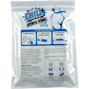 A cooling towel in a silver pouch, featuring a design with instructions and a logo. The towel is light blue.