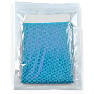 A cooling towel packaged in a clear plastic pouch, featuring a vibrant blue design with a textured surface.