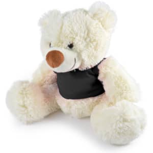 A stuffed plush teddy bear in cream with a brown nose, wearing a black vest, sits with its arms and legs spread out.